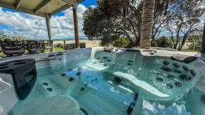 Large riverfront home with spa and stage